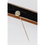Victorian cats-eye chrysoberyl and diamond yellow and rose metal stick pin, the cabochon cut cats-