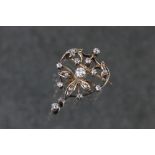 Late Victorian/ Edwardian diamond unmarked yellow gold brooch, the principal round old cut diamond