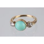 Early 20th century turquoise and diamond 14ct yellow gold three stone ring, the central round