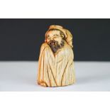 Antique ivory figure of an oriental bearded man in robe, possibly maritime ivory