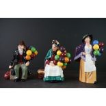 Three Royal Doulton Figures including The Balloon Man HN1954, The Old Balloon Seller HN1315 and