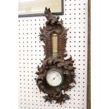 Late 19th / Early 20th century Wall Barometer / Thermometer contained in a Rococo style Scrolling