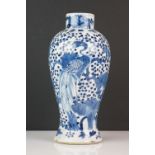 Chinese Blue and White Vase decorated with a peacock amongst foliage, four character marks to
