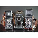 Three medium format twin lens reflex cameras. To include a Mamiyaflex, Yashica-Mat & a Photina