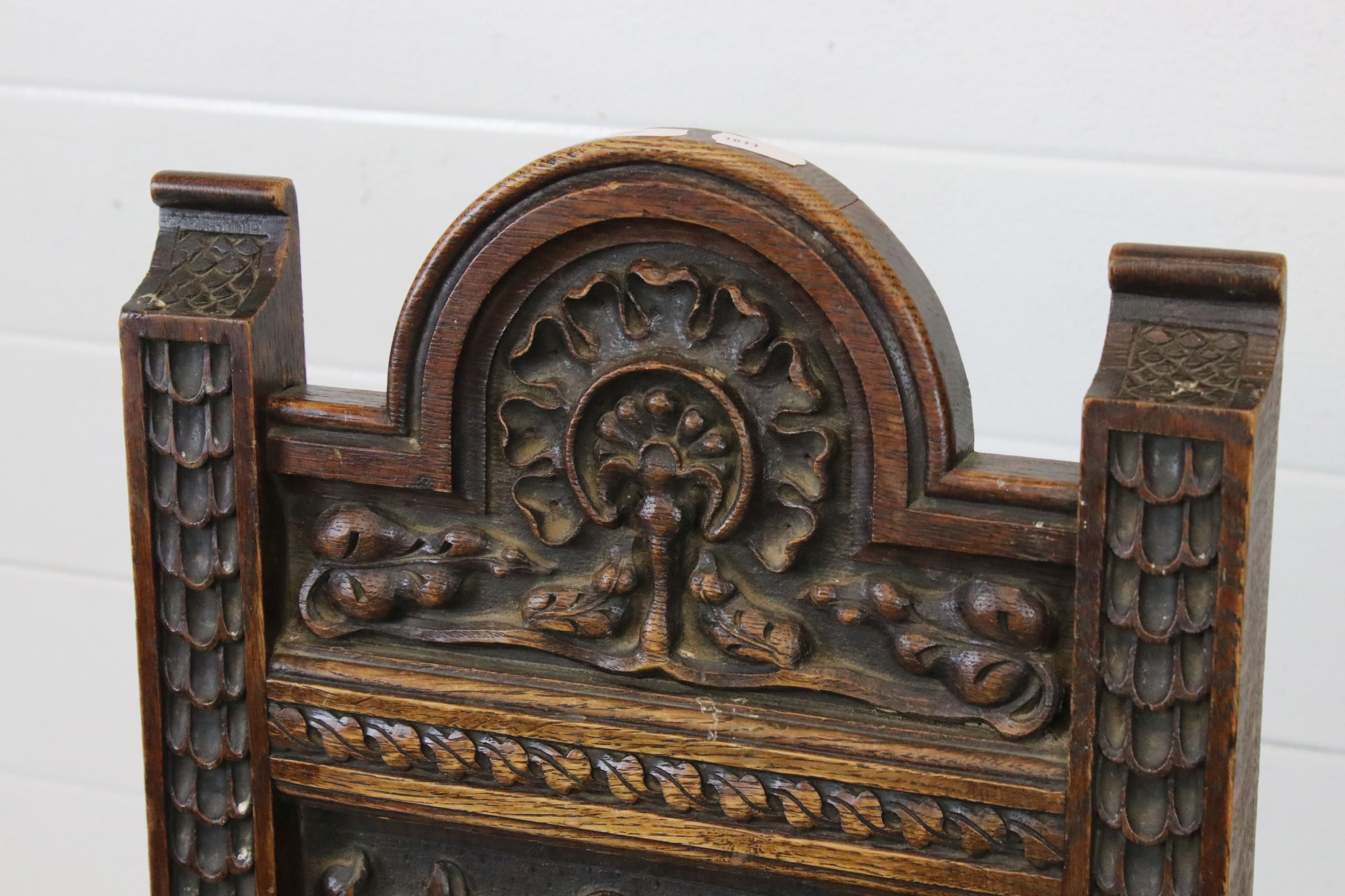 Victorian Jacobean Revival Oak Hall Chair, the arched rectangular back heavily carved with foliage - Image 3 of 5