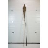 A large tribal ceremonial paddle, stands approx 225cm in height together with a Tribal Hardwood