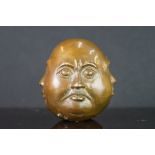 Bronze four faced Buddha paperweight with character marks, approx. 6cm tall