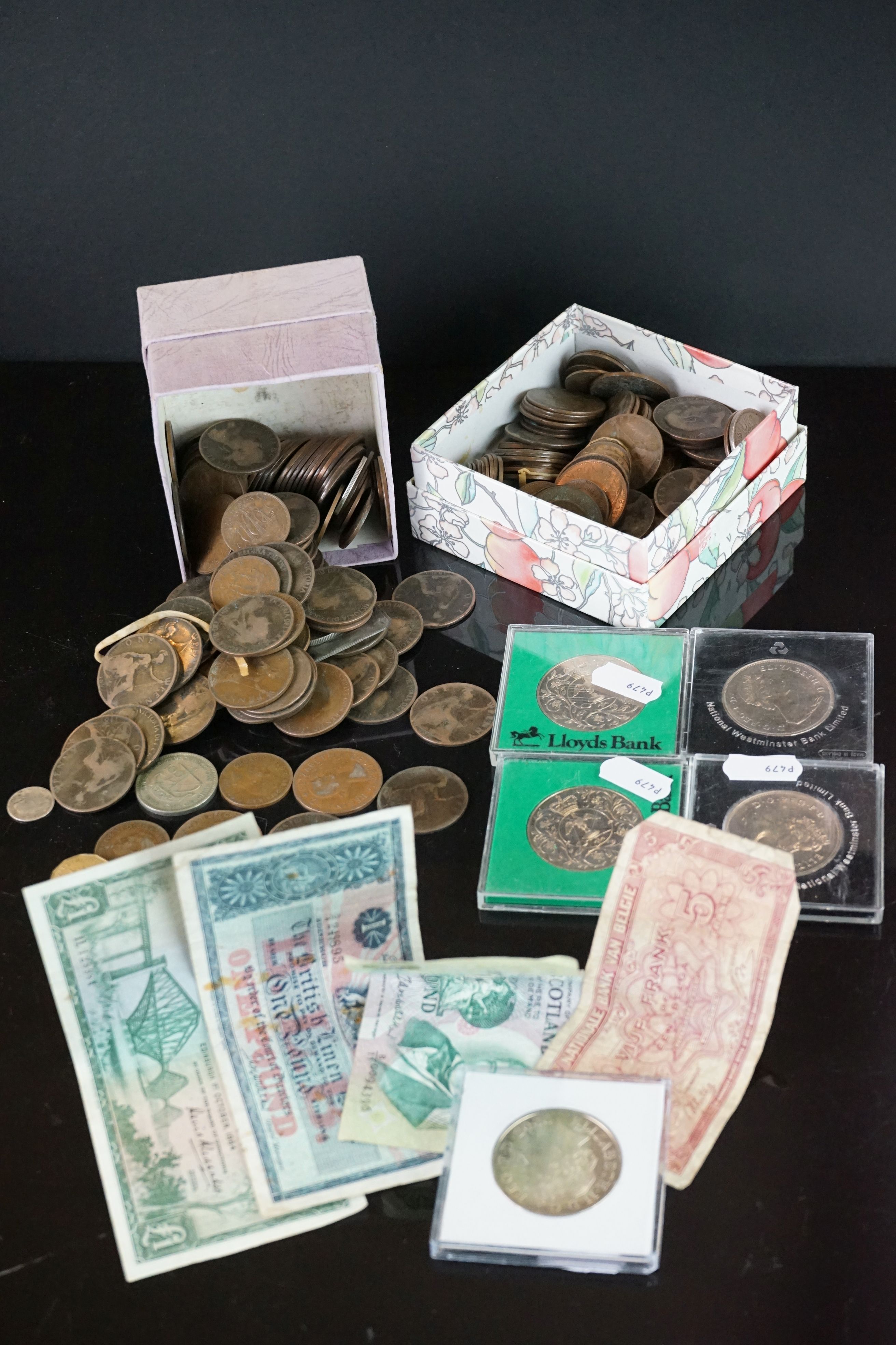 A collection of mainly pre decimal British coins together with commemorative crowns and banknotes.