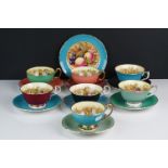 Seven Aynsley Tea Cups and Saucers with fruits decoration plus a matching tea plate
