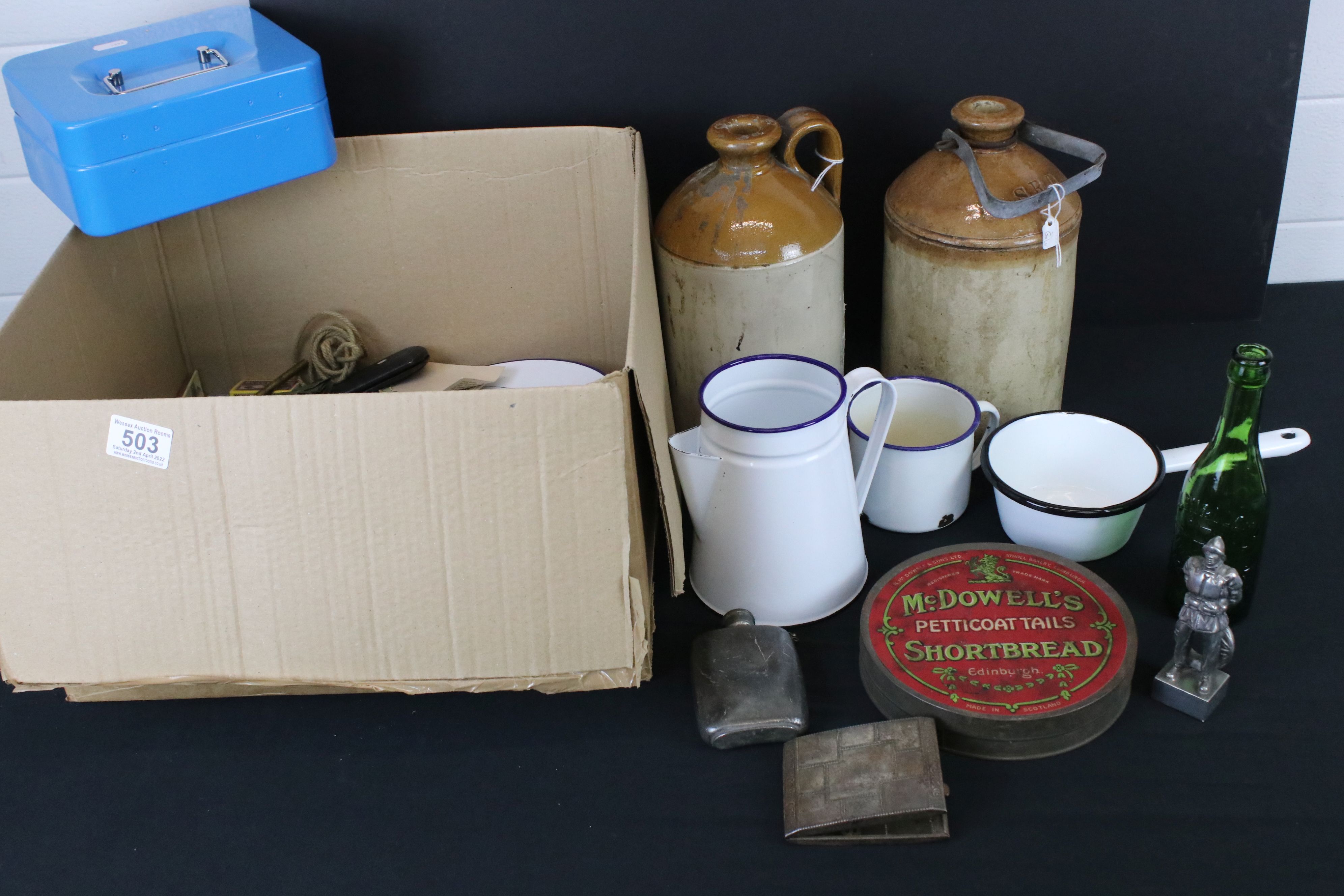 A box of mixed collectables to include stoneware bottles, enamel plates and cups, bottles and