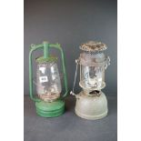 Two vintage paraffin storm lanterns.