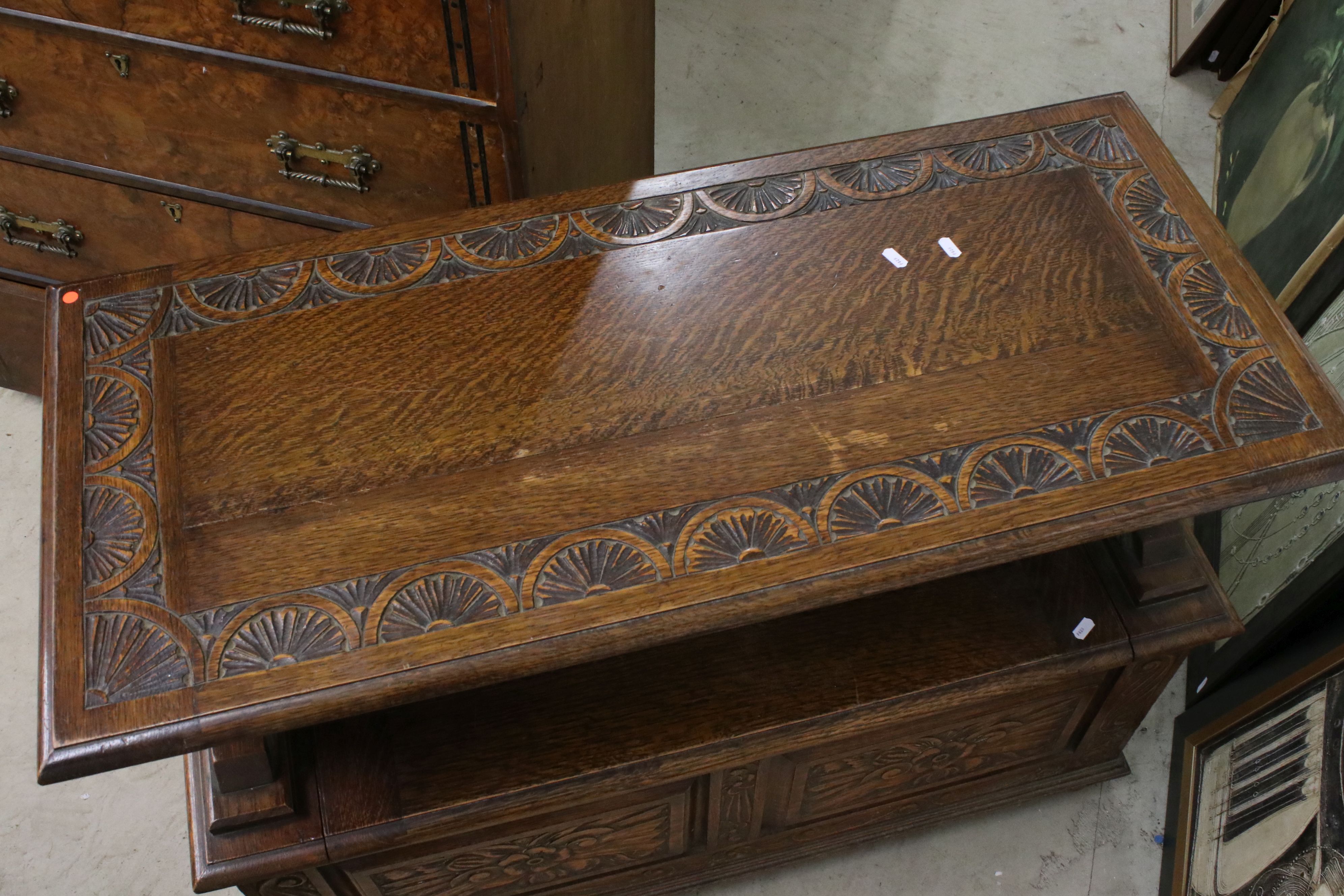 Early 20th century Oak Monk's Bench, the hinged top opening to show a carved scene of George and the - Image 6 of 7