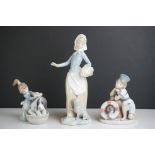 Two Lladro Figures including Monday's Child 15cm high and Bashful Bather together with a Zaphir