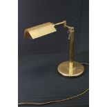 Contemporary brass adjustable table lamp