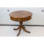 Drexel Heritage Mahogany and Walnut Drum Table with single drawer raised on a pedestal support and