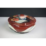 Moorcroft Lidded Powder Jar decorated in the Red Tulip pattern, impressed blue marks to base, 13cm