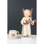 Goebel Hummel Festival Harmony Angel playing a Mandolin with a Bird 27cm high together with