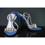 A pair of blue Prada hight heel shoes with gold studs and clear jewels, size 41.