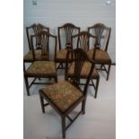 Good set of six chairs in the Georgian manner, with original needlework seats