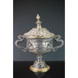 A late 19th / early 20th century Chinese pot pouri jar, white & gilt metal with floral pierced
