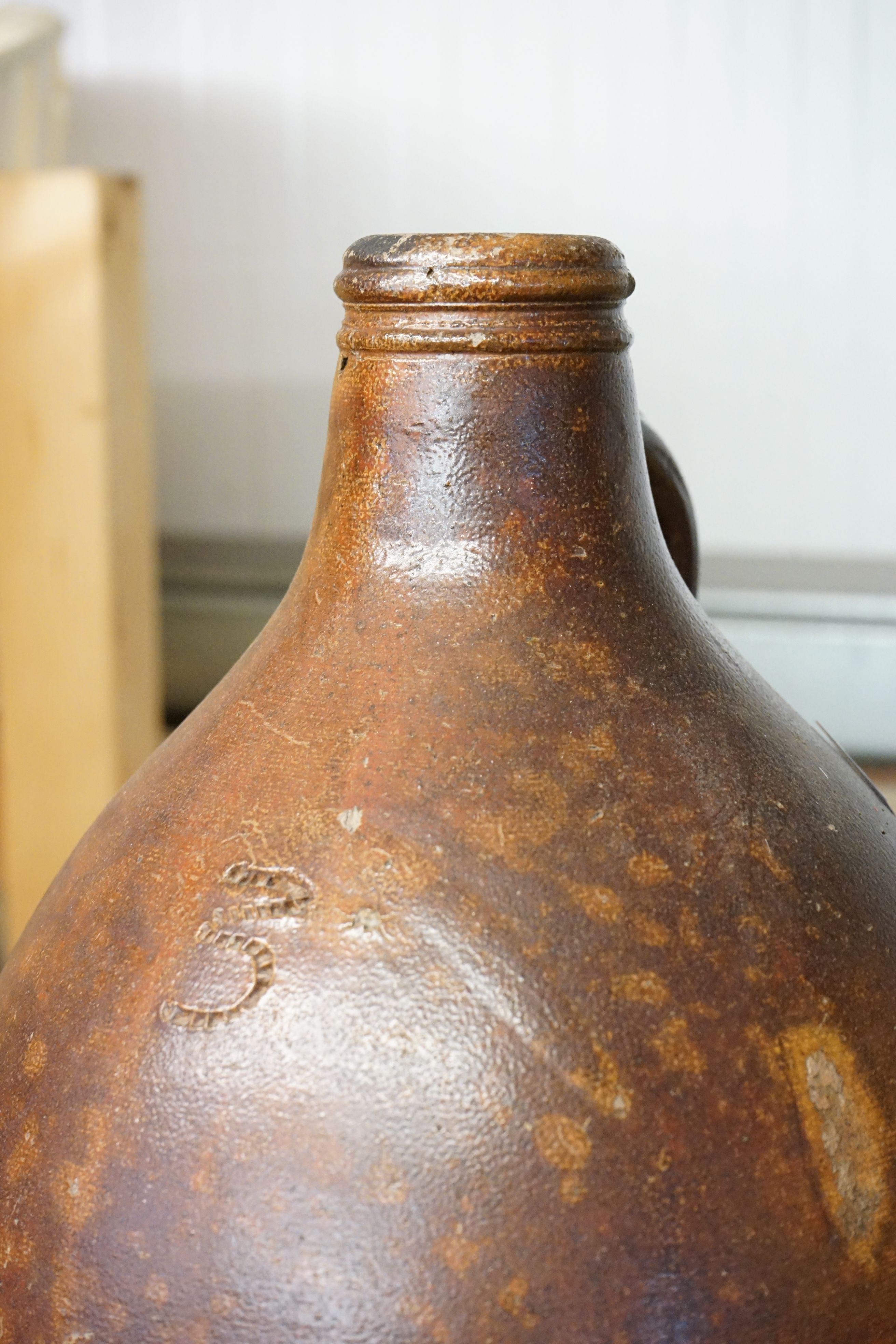 Three stoneware bottles to include a Bradford On Avon advertising example. - Image 3 of 4