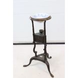 George II Mahogany Washstand with bowl aperture, two triangular drawers and raised on three