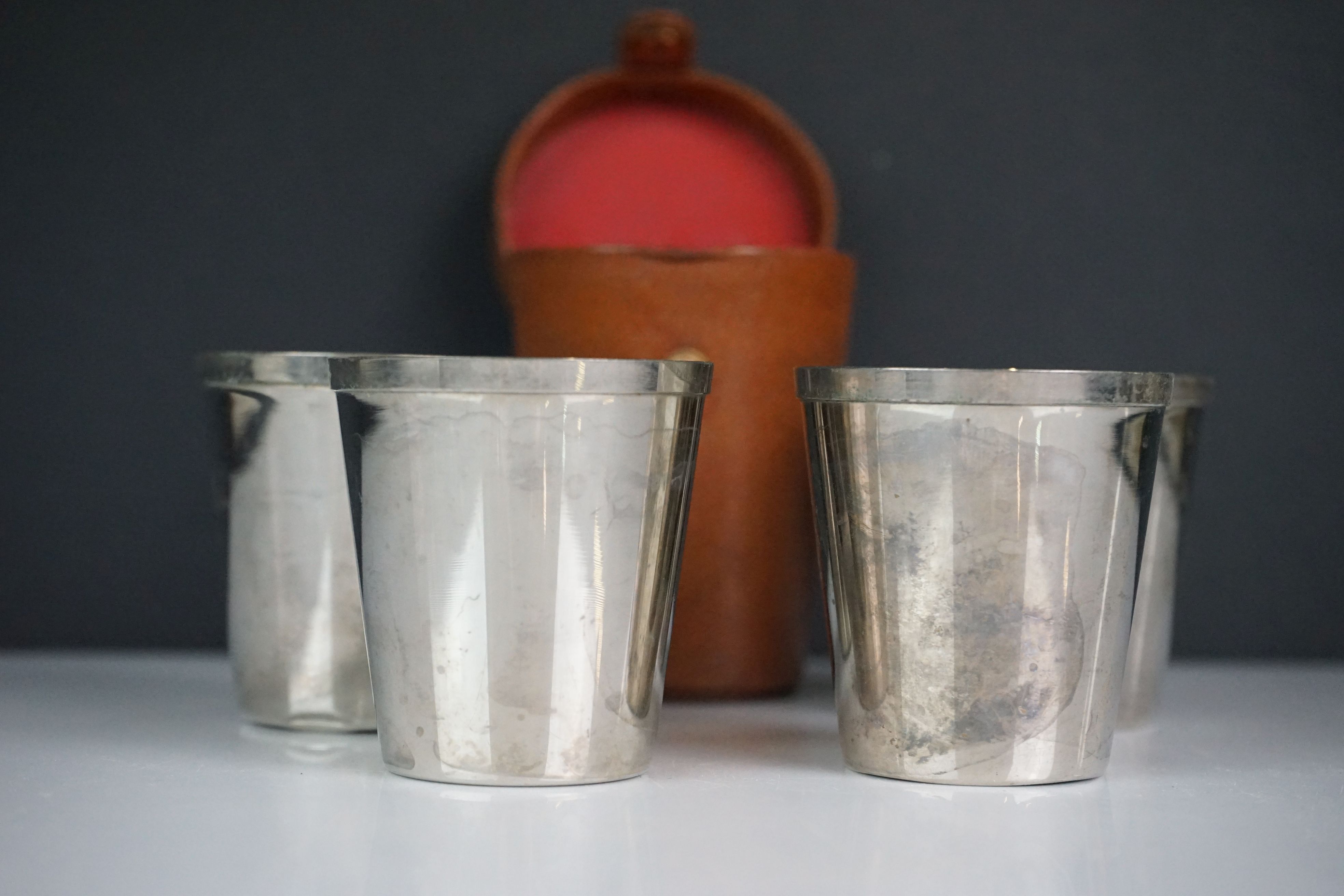 A set of four silver plated stirrup cups in brown leather case. - Image 2 of 5