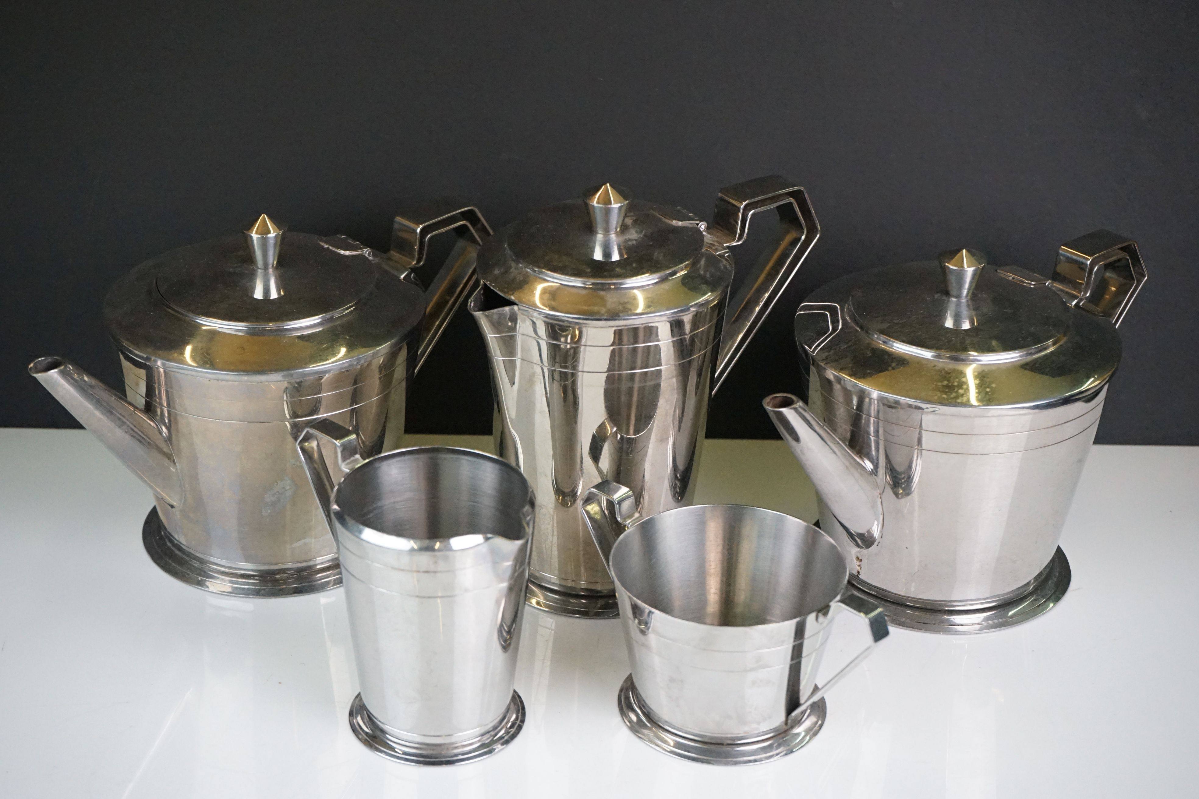 A mid 20th century stainless steel tea service by Oldhall.