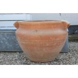 A very large terracotta plant pot, measures approx Height 54cm x Width 82cm