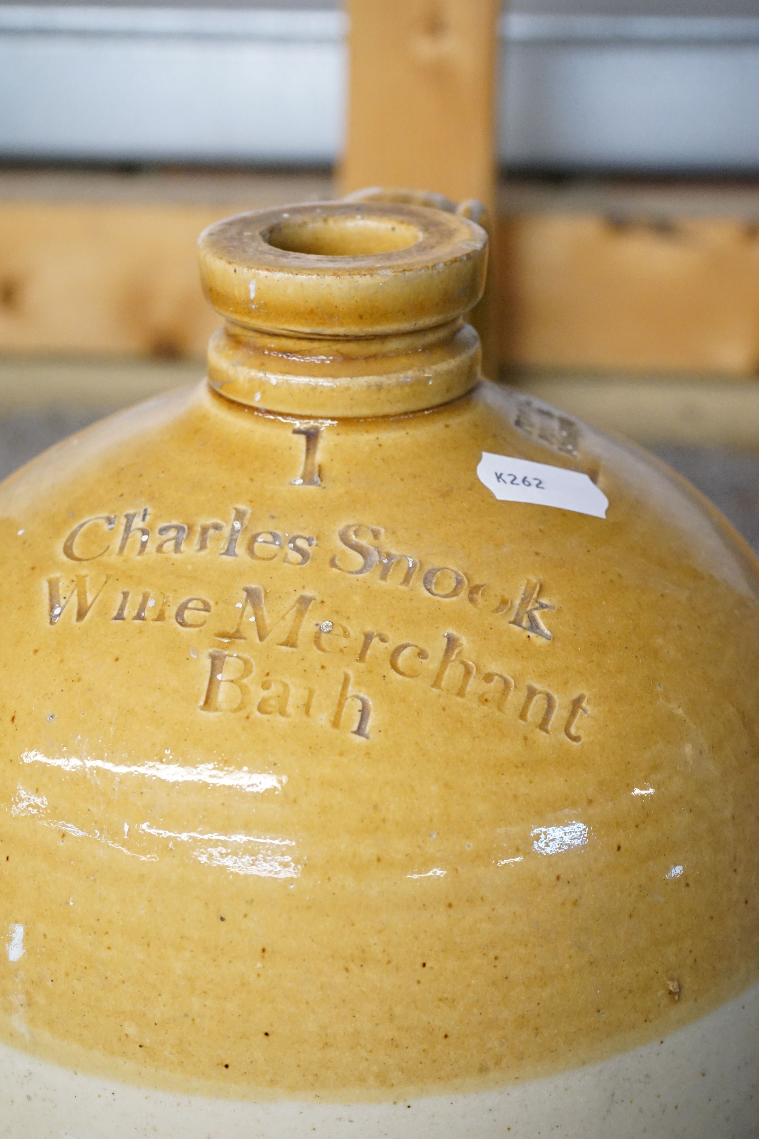 Three stoneware bottles to include a Bradford On Avon advertising example. - Image 4 of 4