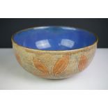 Royal Doulton Stoneware Bowl with leaf decoration on a green mottled ground, impressed marks to base