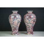 Pair of Chinese Vases with red and blue flower decoration, six character marks to base, 15cm high