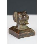 Metal seal with character marks, with a dog head finial, approx. 4cm tall