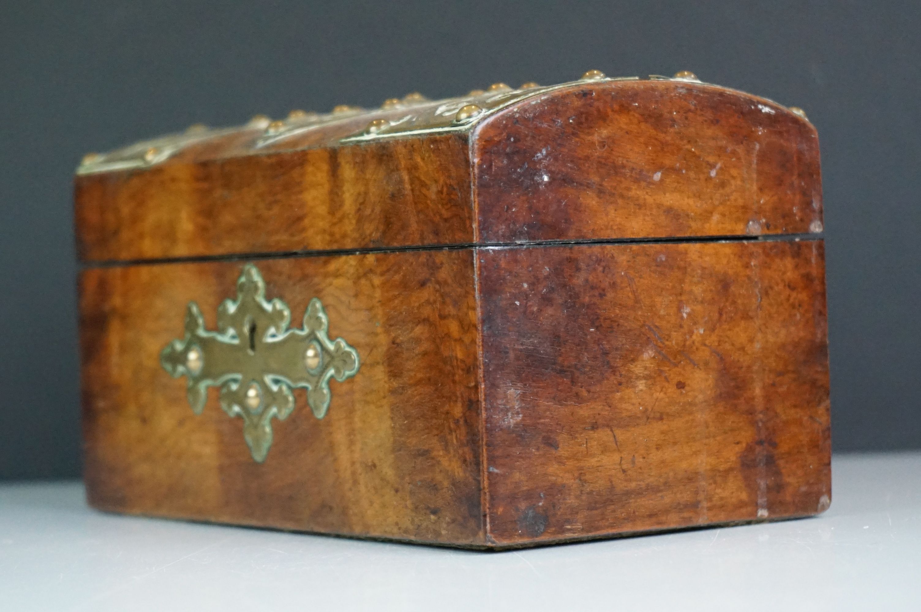 A wooden tea caddy in the form of a chest with brass pierced decoration. - Image 3 of 8