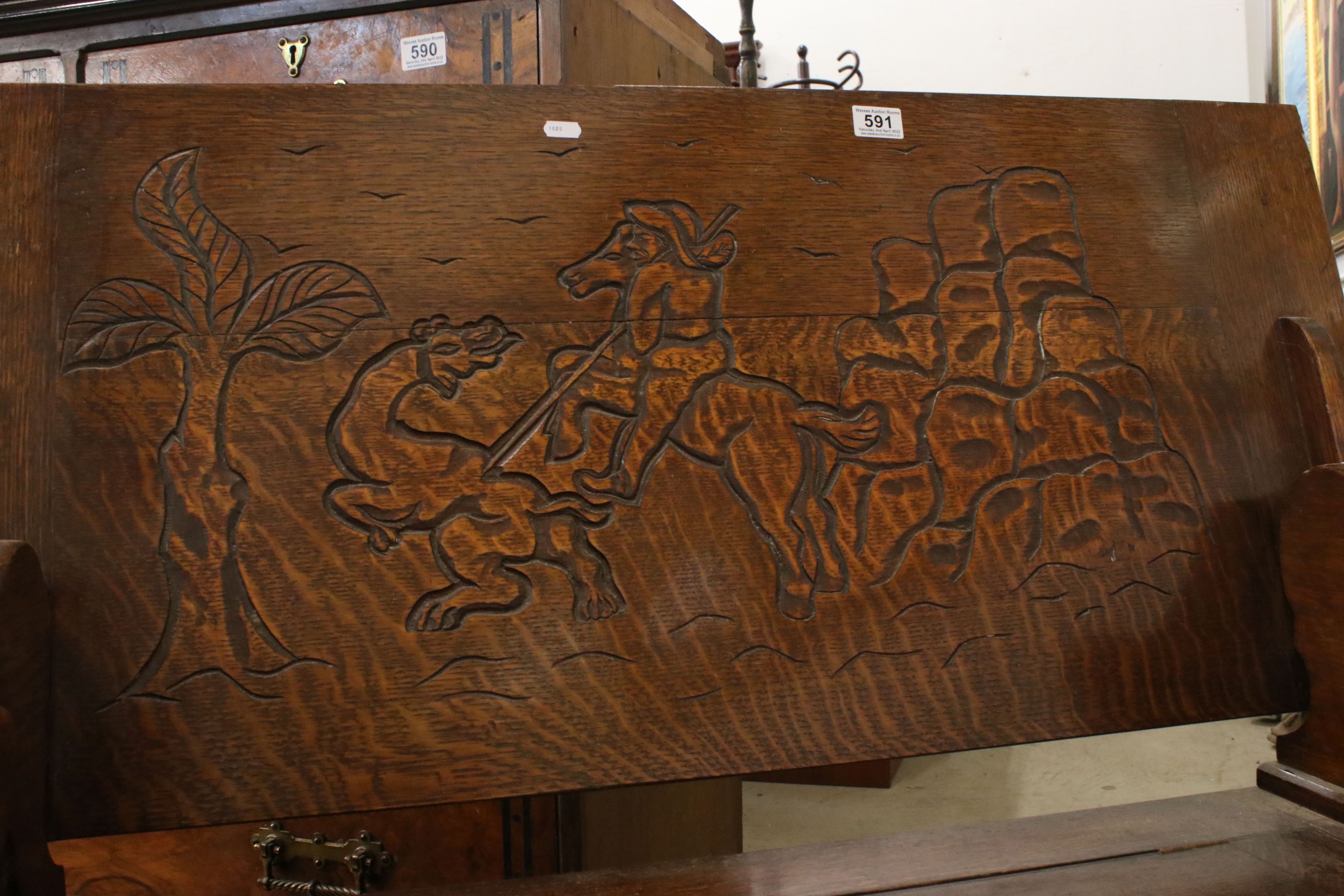 Early 20th century Oak Monk's Bench, the hinged top opening to show a carved scene of George and the - Image 4 of 7