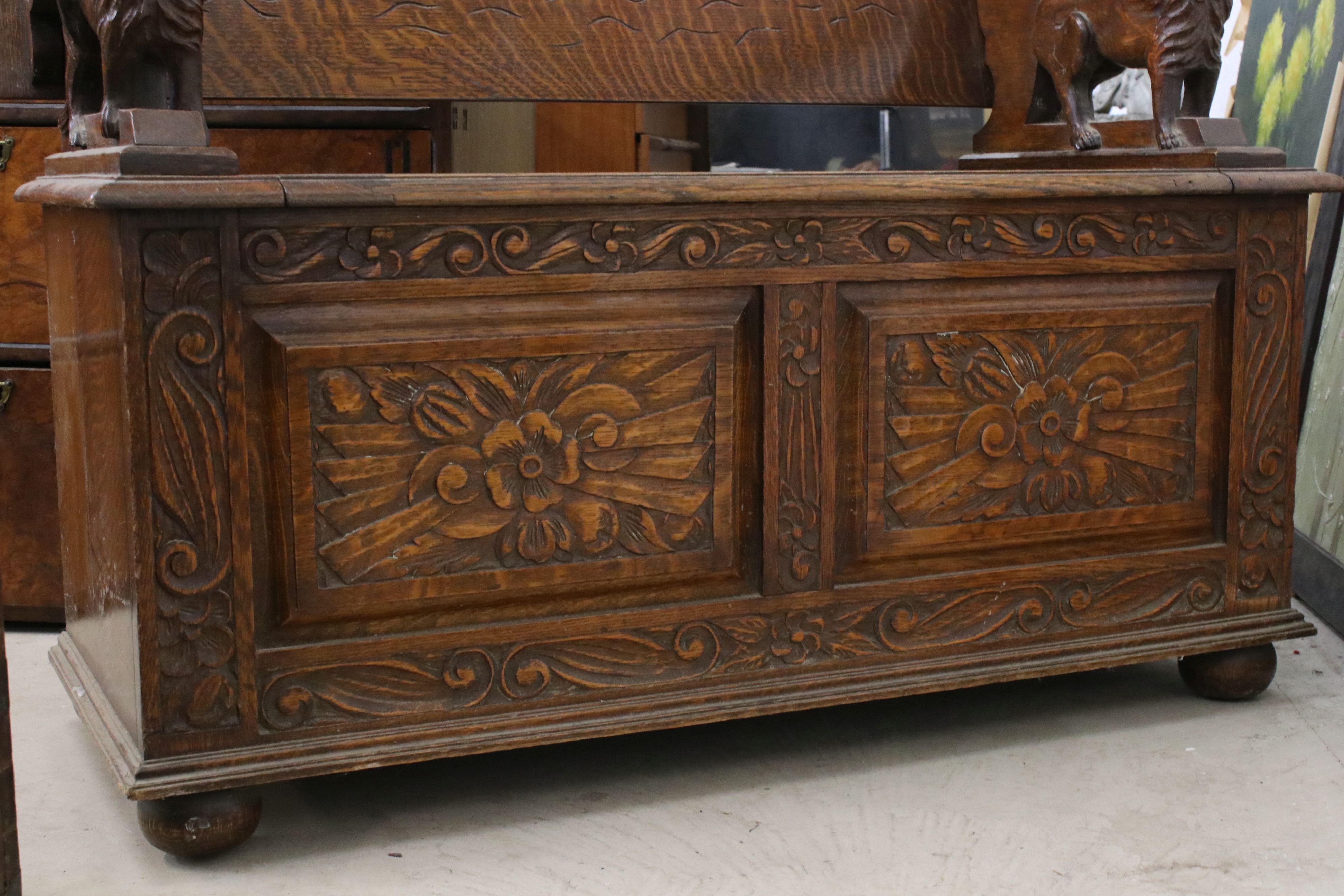 Early 20th century Oak Monk's Bench, the hinged top opening to show a carved scene of George and the - Image 5 of 7