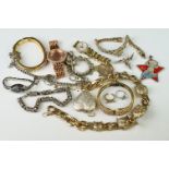 A small collection of mixed costume jewellery to include silver examples.