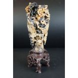 Chinese Soapstone Vase, intricately carved to front with fruits, foliage and animal, 34cm high