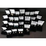 A collection of cased 925 sterling silver earrings.