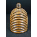 Late 19th / Early 20th century Treen Ring Carved Lidded Box of Beehive form, 17cm high