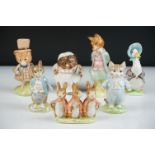 Seven Beswick Beatrix Potter Figures including Flopsy, Mopsey and Cottontail (gold oval stamp),