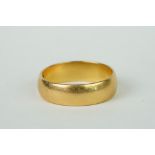 A fully hallmarked 22ct gold wedding band.