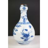 Chinese Porcelain Blue and White Garlic Vase decorated with flowers, 22cm high