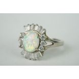 A 925 sterling silver and opal dress ring.