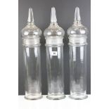 Three Clear Glass Sweet / Apothecary style Jars and Covers with faceted finials, 59cm high