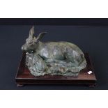 Patinated Bronze Recumbent Deer and Fawn on Oriental style Wooden Plinth