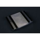Art Deco Chrome and Black Enamel Box, the hinged lid opening to a cedar lined twin division