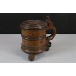 18th century Scandinavian Birchwood Peg Tankard, the domed lid with a lion, the scroll handle with a