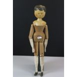 19th century Grodnertal style Wooden Peg Doll with painted head and bottom half of arms and legs,