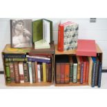 A large collection of Folio society hardback books contained within two boxes.